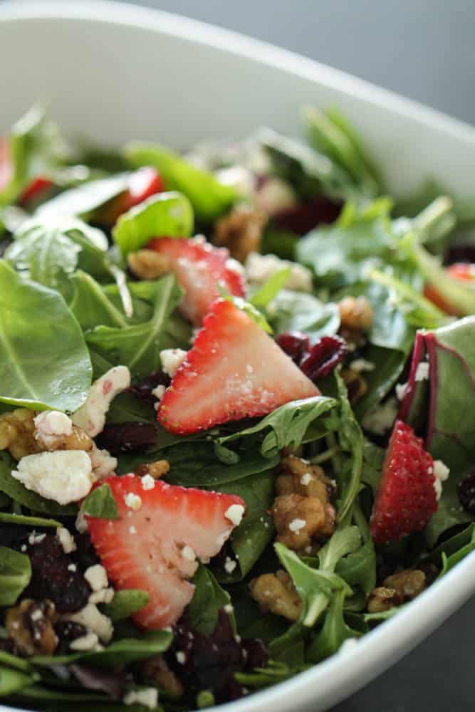 Spring Salad with Homemade Lemon Poppyseed Dressing in a bowl
