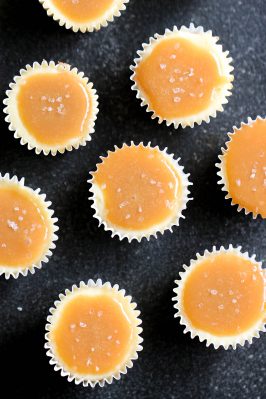 Mini Salted Caramel Cheesecakes all on a platter, ready to serve
