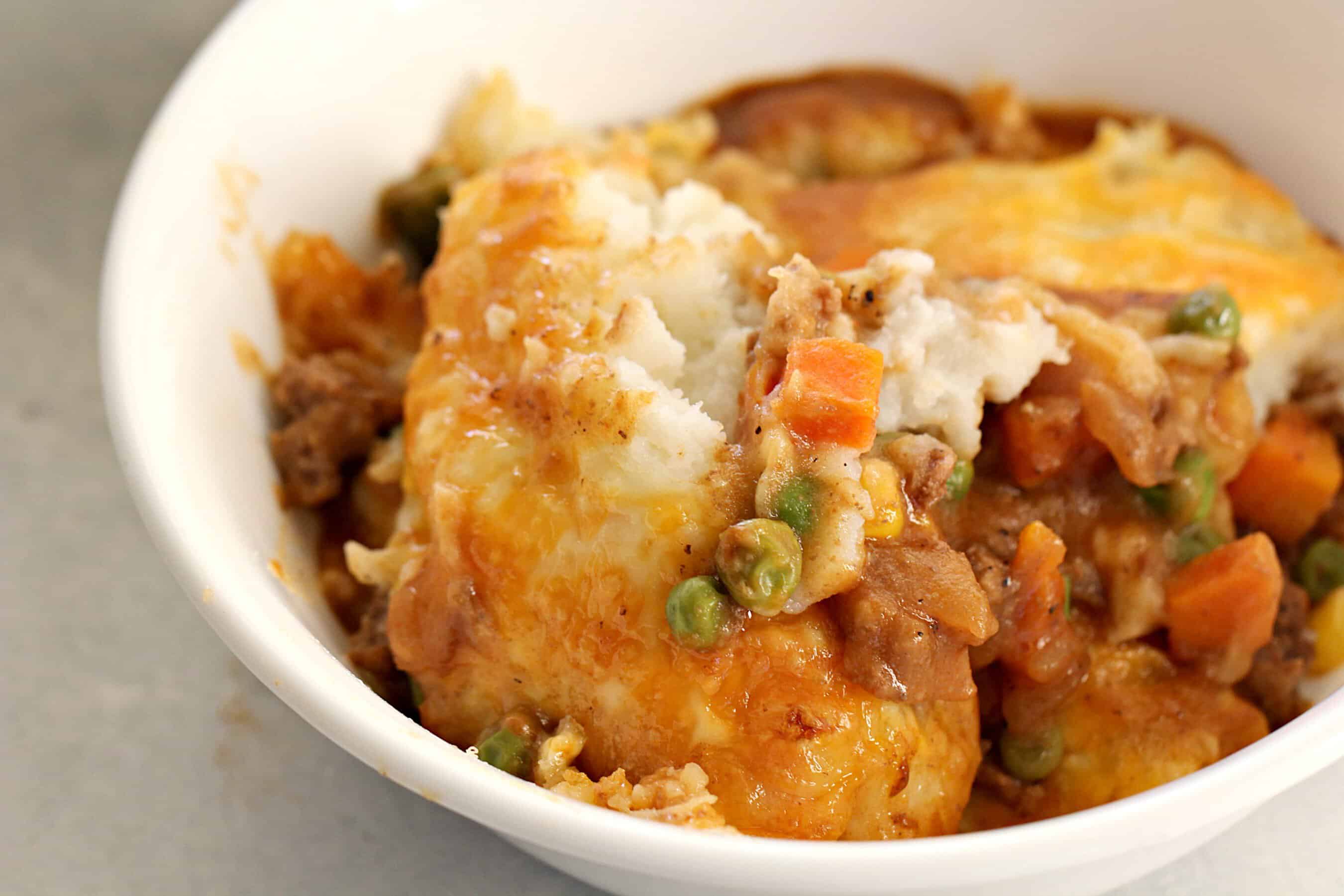 A serving of Shepherd's Pie in a white bowl