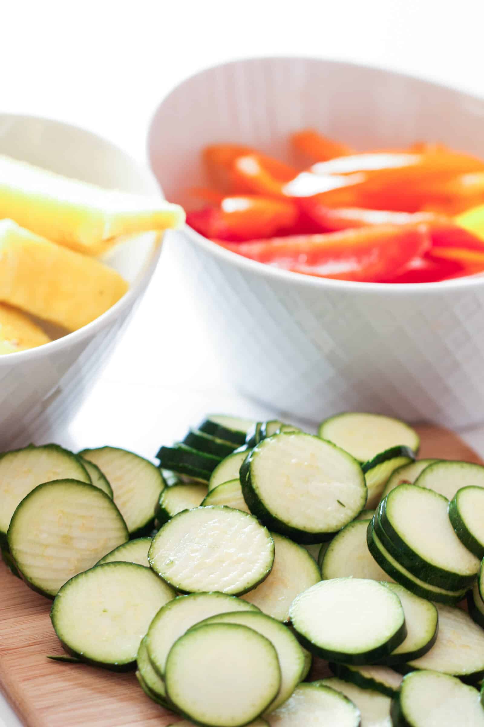 Chopped zucchini, red pepper, and pineapple ready for the recipe