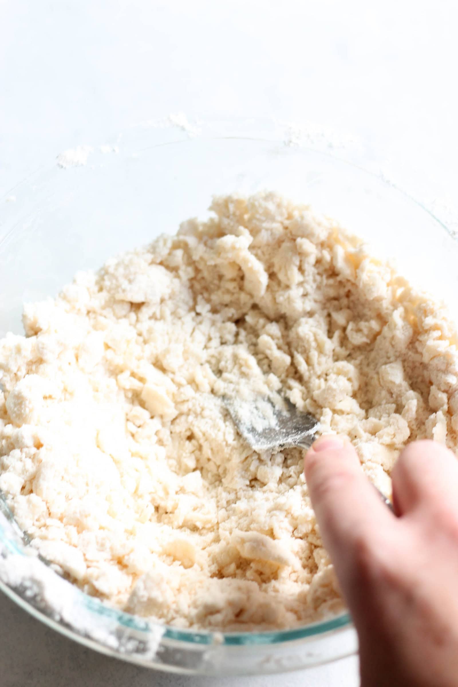 Shortbread ingredients in a mixing bowl with a fork