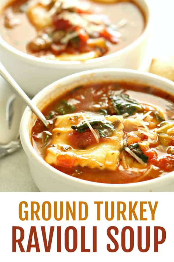 Ground Turkey Sausage Ravioli Soup in a white bowl with a spoon