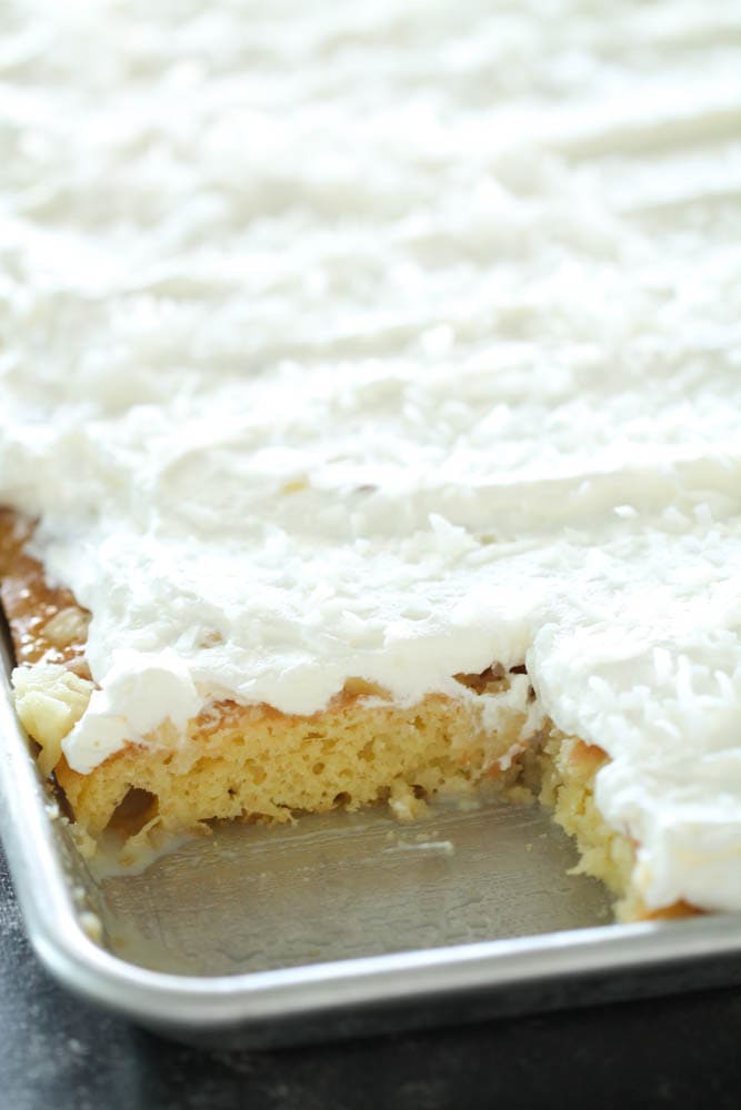 Sheet Pan Hawaiian Poke Cake with a slice missing