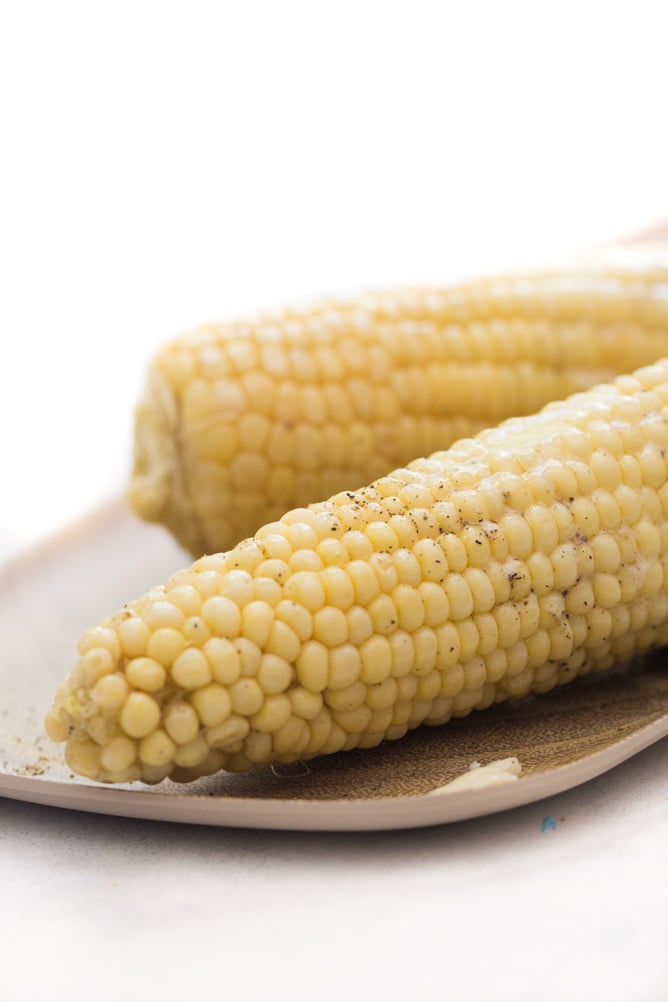 Slow Cooker Corn on the Cob on a plate