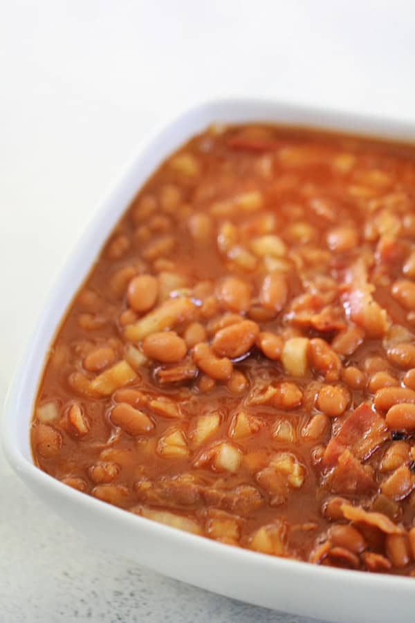 https://www.sixsistersstuff.com/wp-content/uploads/2018/07/Slow-Cooker-Baked-Beans-with-Bacon-on-SixSistersStuff-600x900.jpg