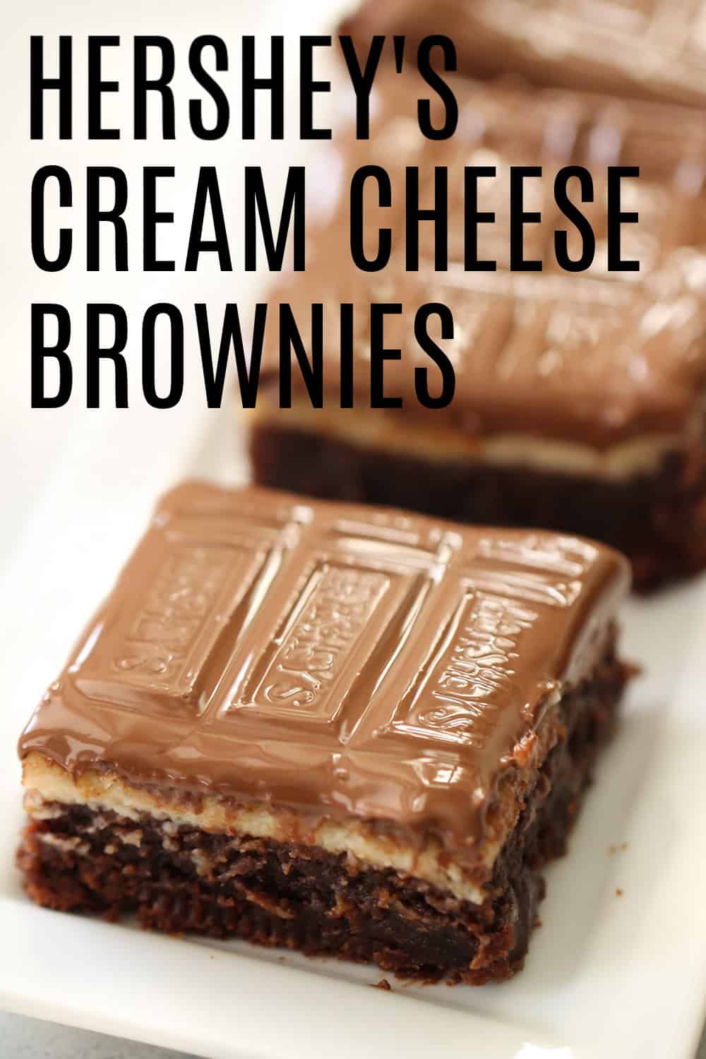 Hershey’s Cream Cheese Brownie square on a white dish