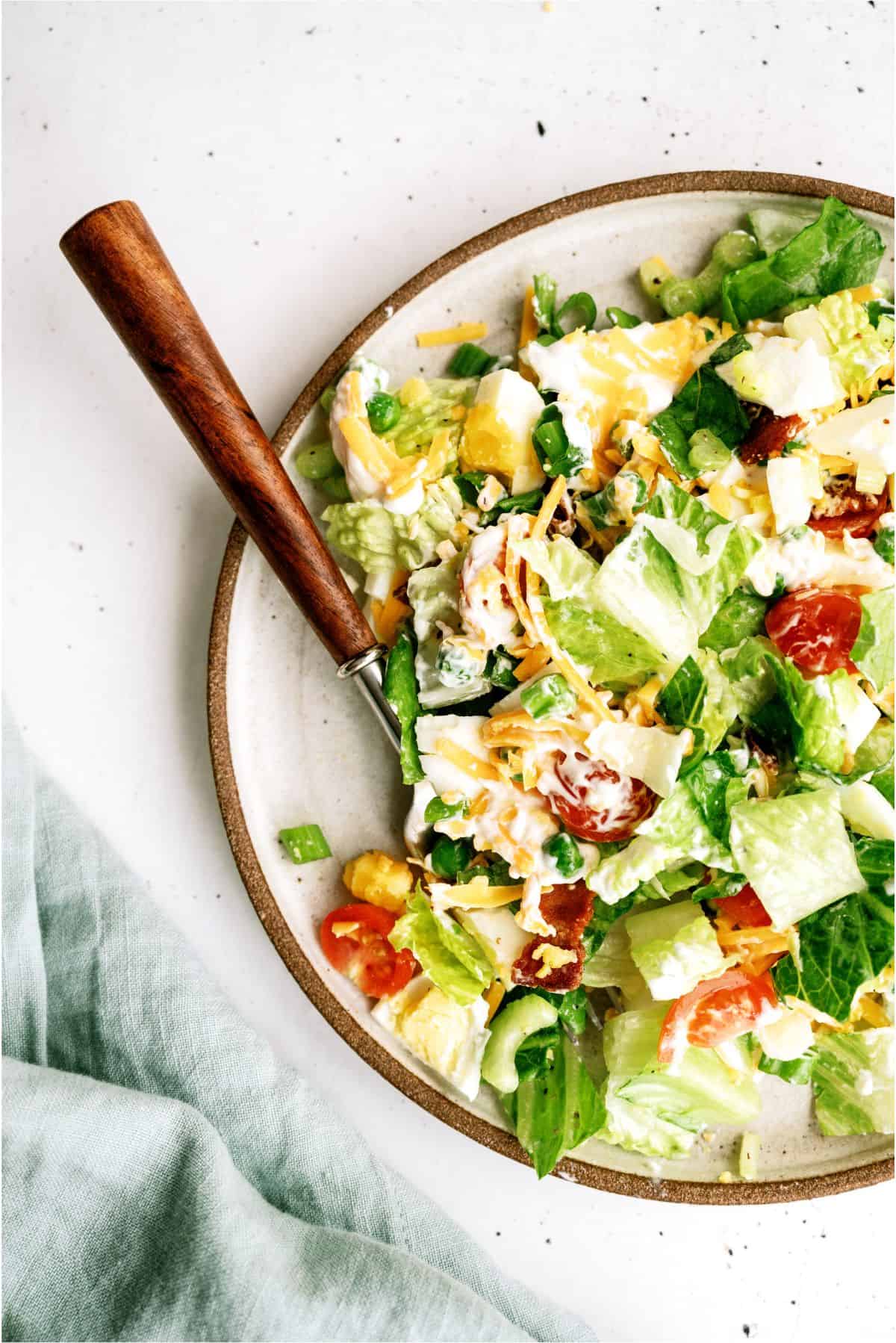 Close up of a plate with a serving of Seven Layer Green Salad