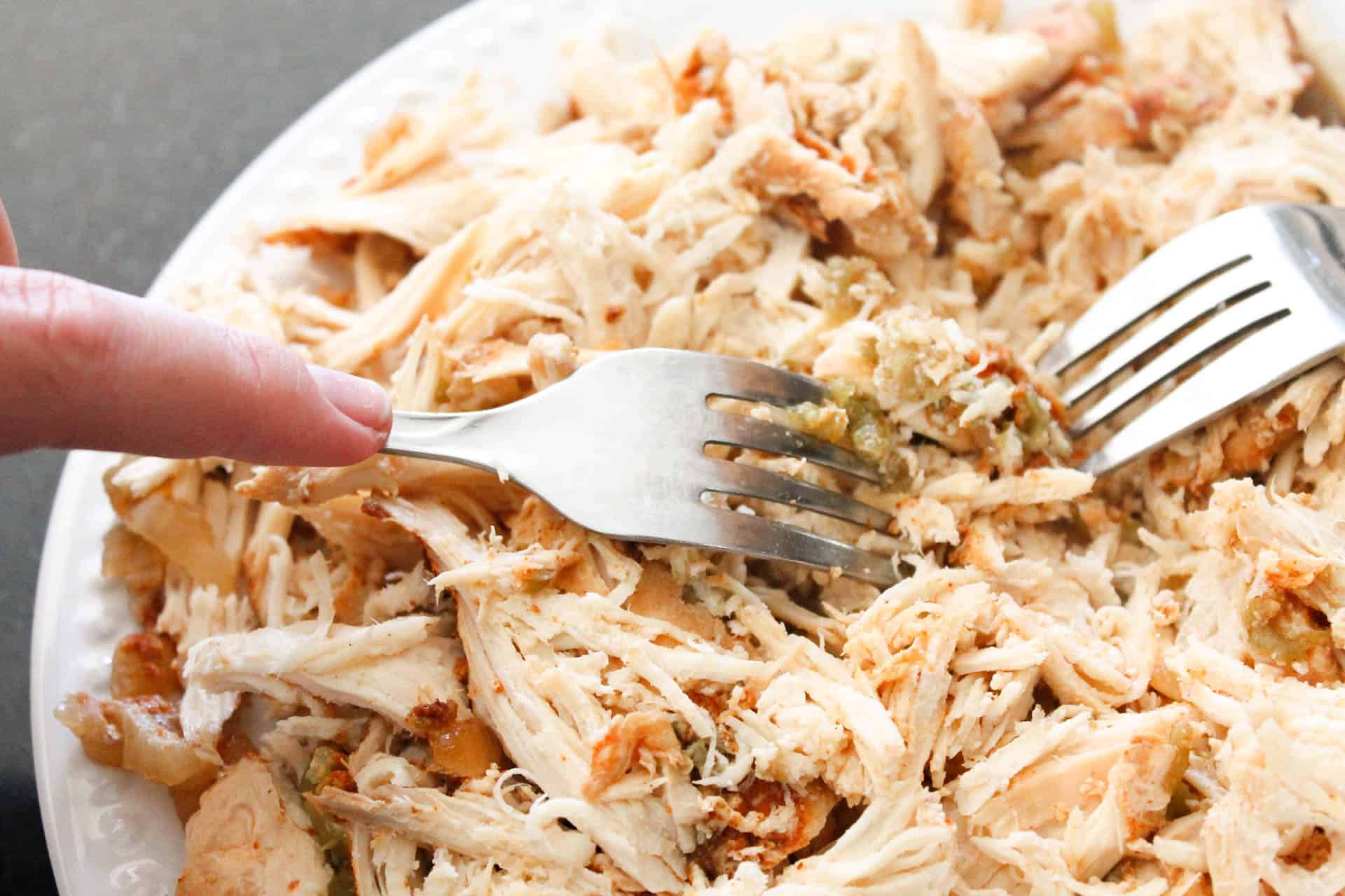 Shredded chicken for Slow Cooker Cheesy Chicken Enchiladas