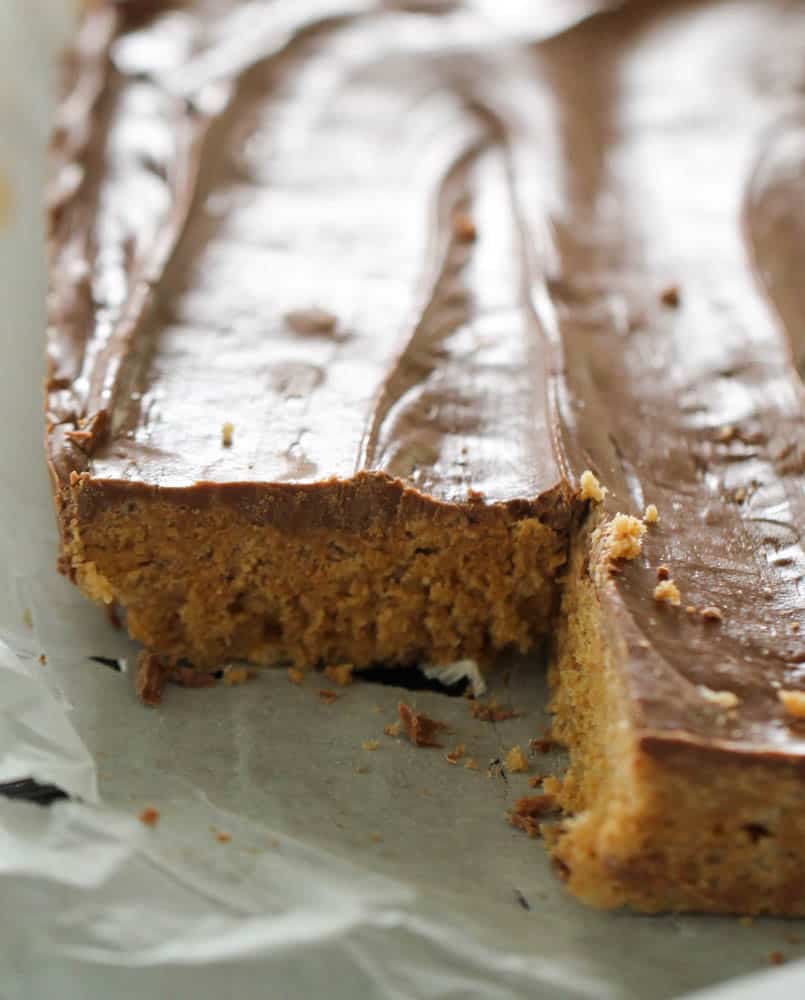 No Bake Scotcheroos in a pan with the corner slice missing