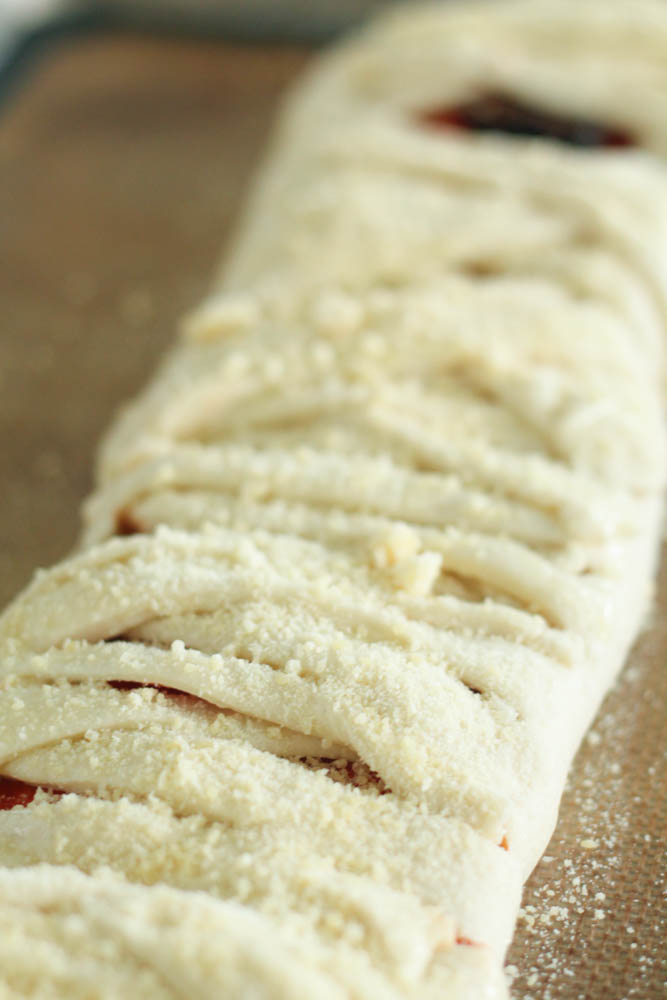 Sprinkled parmesan cheese on top of mummy braid