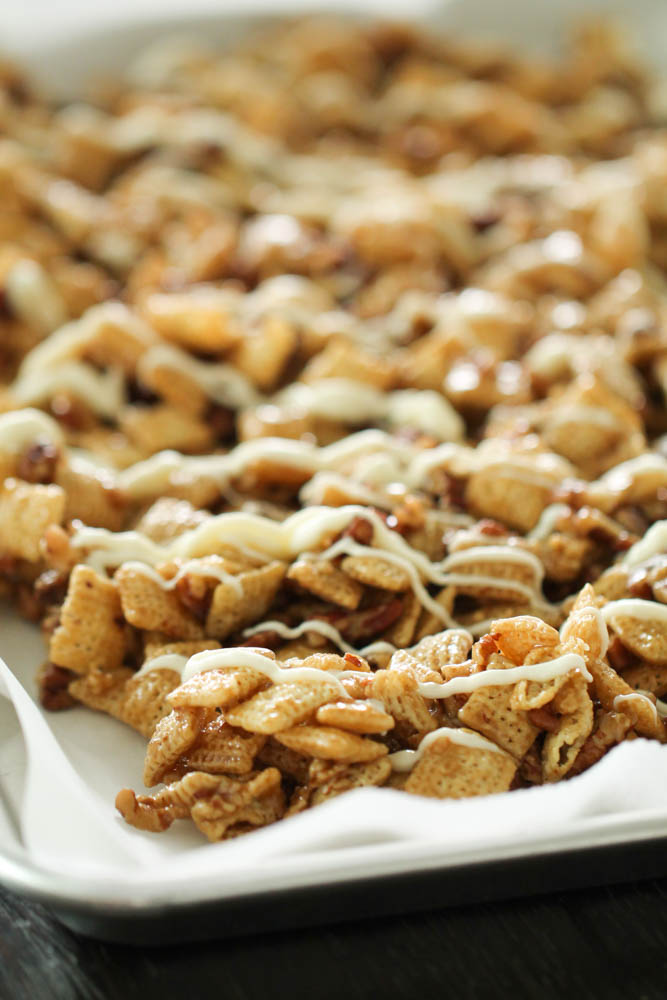 baking sheet loaded with pecan pie chex mix