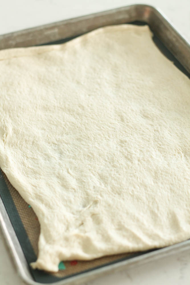Pizza dough on sheet pan