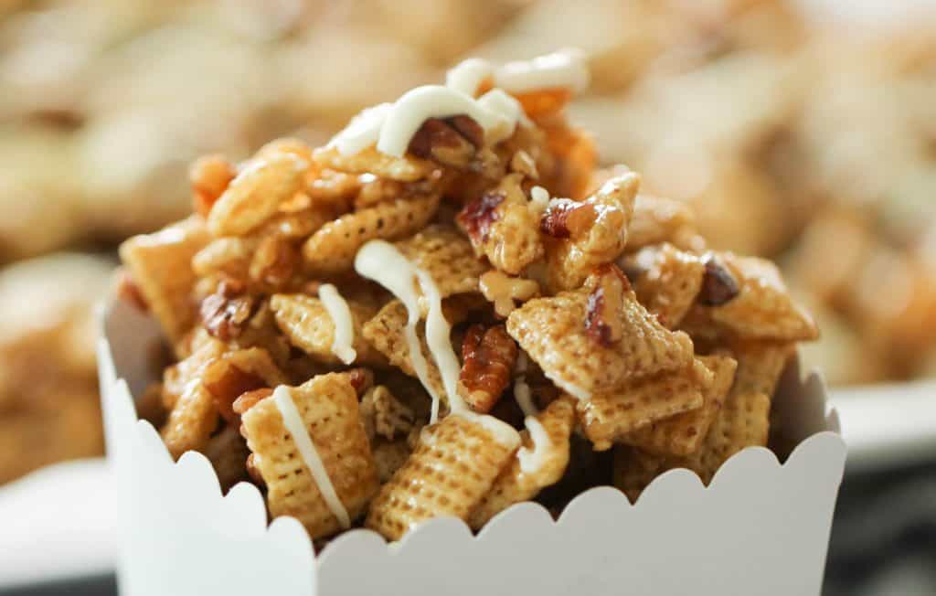 Pecan Pie Chex Mix in a white container.