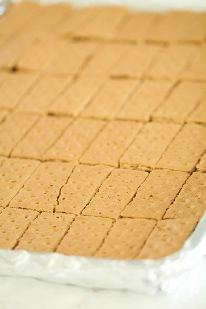 Graham crackers broken into fourths and placed in a baking sheet