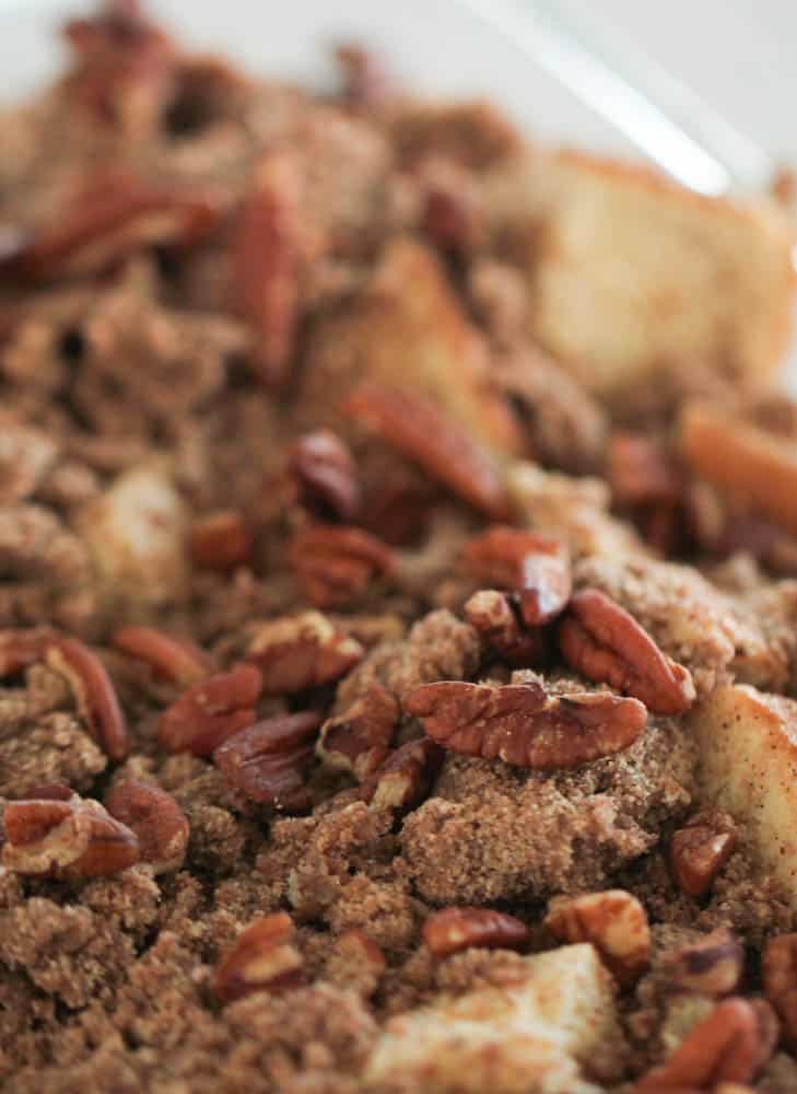 Brown sugar mixture and pecans sprinkled on top of bread