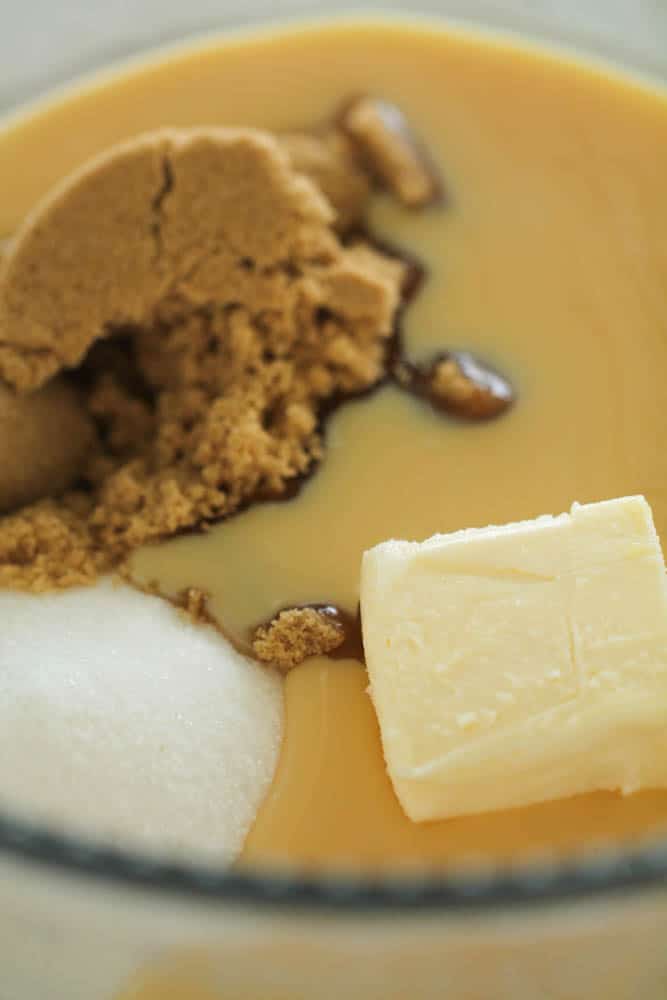 butter, sugar, brown sugar, corn syrup, and sweetened condensed milk in a microwave-safe bowl.