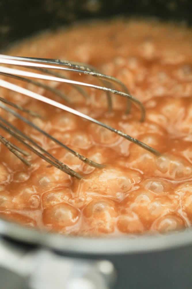 saucepan with butter and brown sugar boiled