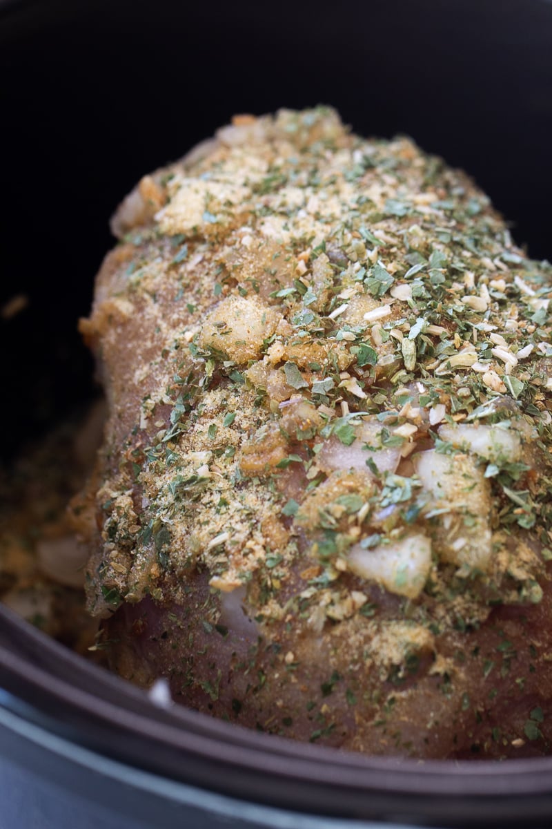 Seasoned and uncooked Turkey Breast in the slow cooker