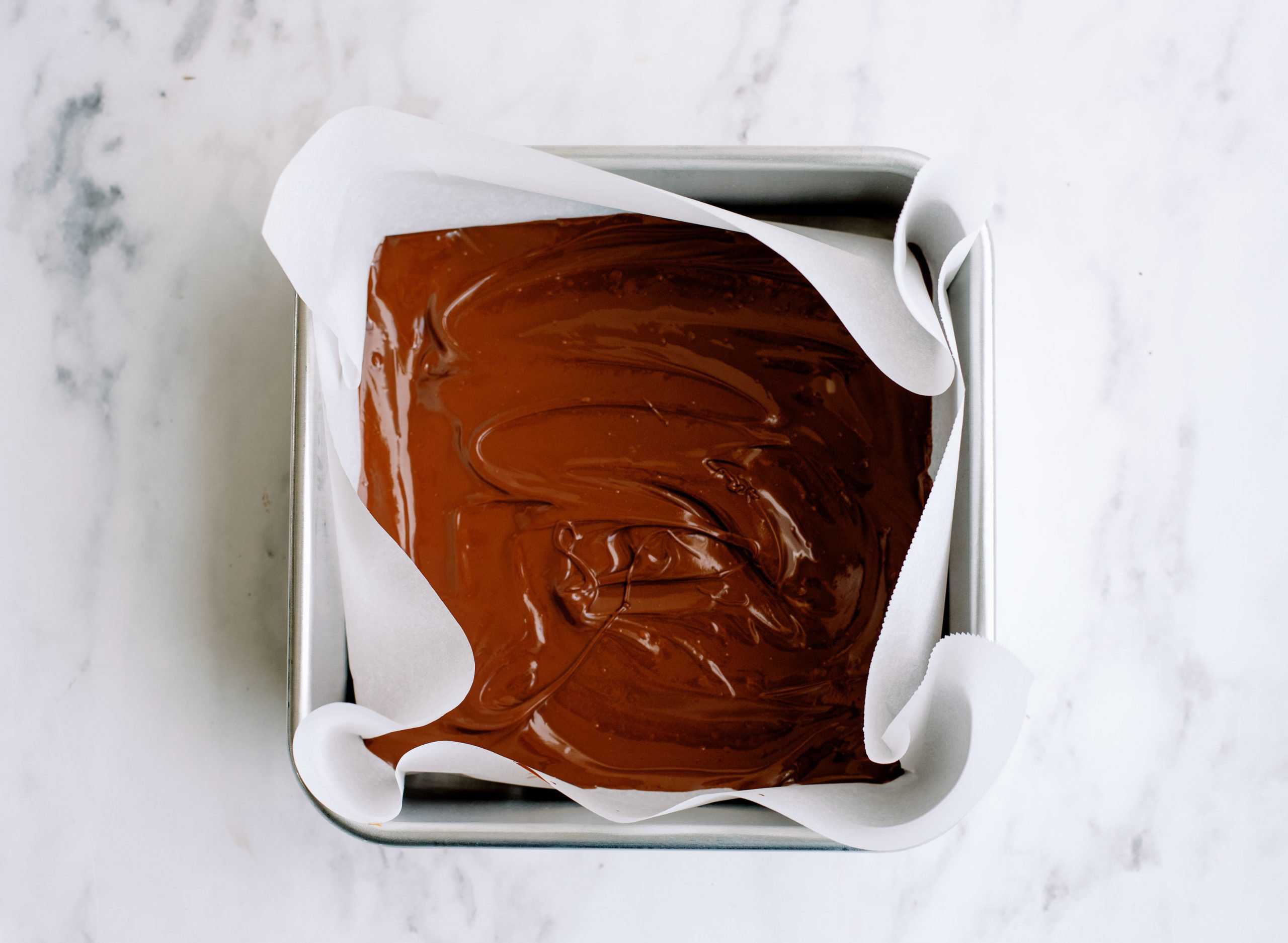 1st layer of fudge in the bottom of the pan