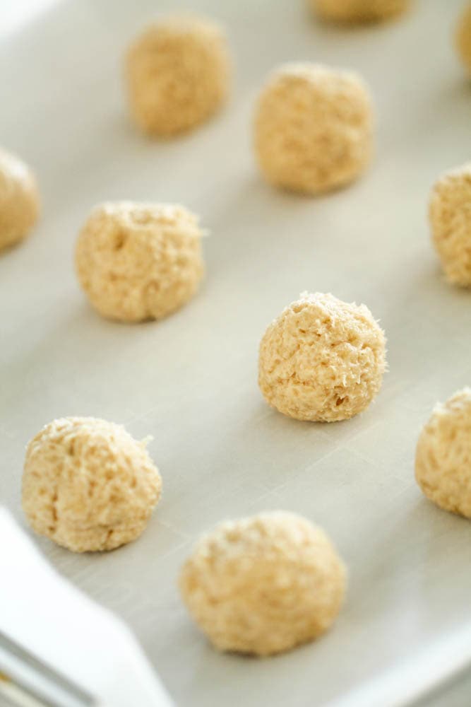 cookie dough balls on a cookie tray