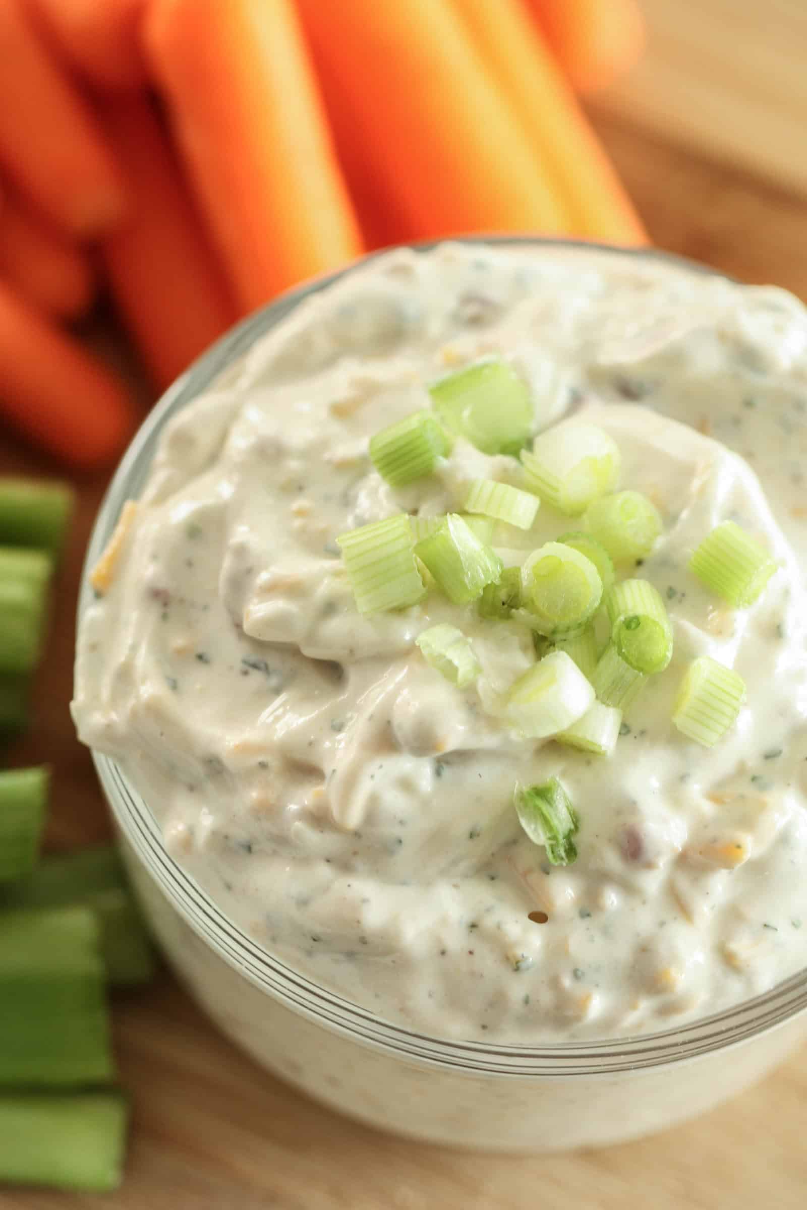 Cowboy Dip served on a plate with a side of carrots