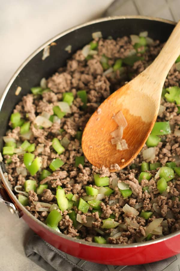 Ground beef in a pan with peppers