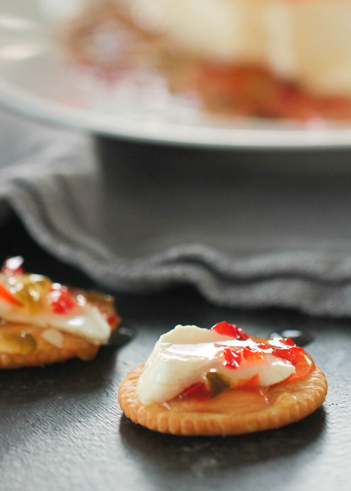 Ritz crackers with Easy Red Pepper Jelly and cream cheese on them