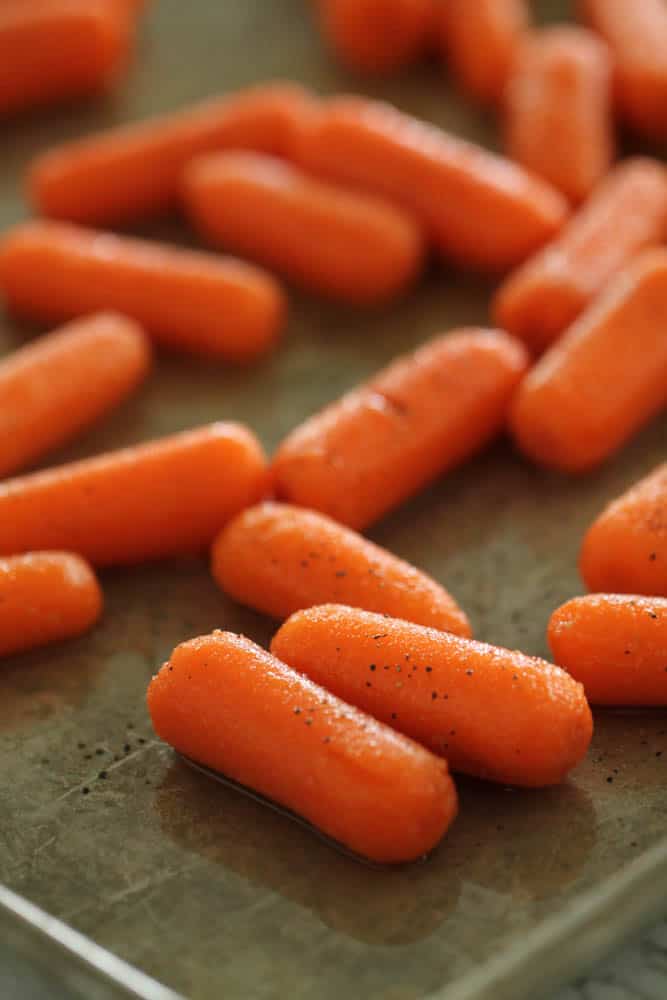 Carrots on baking sheet seasoned