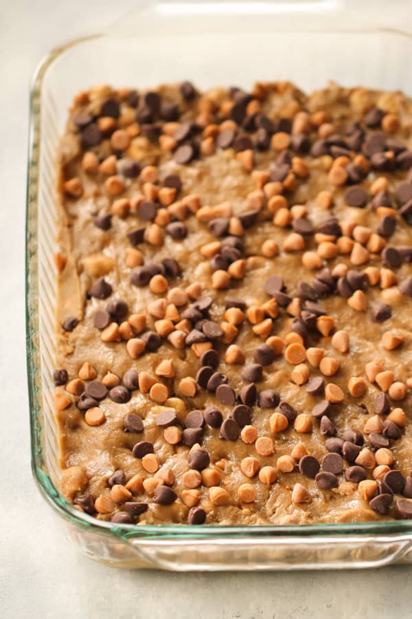 Unbaked Butterscotch Chocolate Chip Blondies in a pan