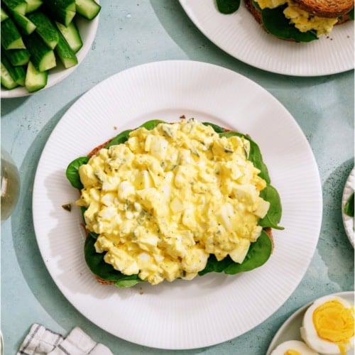 Top view of a slice of bread topped with High Protein Egg Salad.