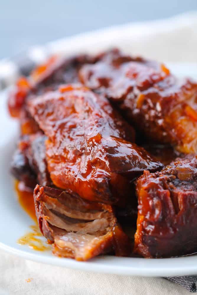 https://www.sixsistersstuff.com/wp-content/uploads/2019/01/Tender-and-Juicy-Slow-Cooker-BBQ-Ribs.jpg