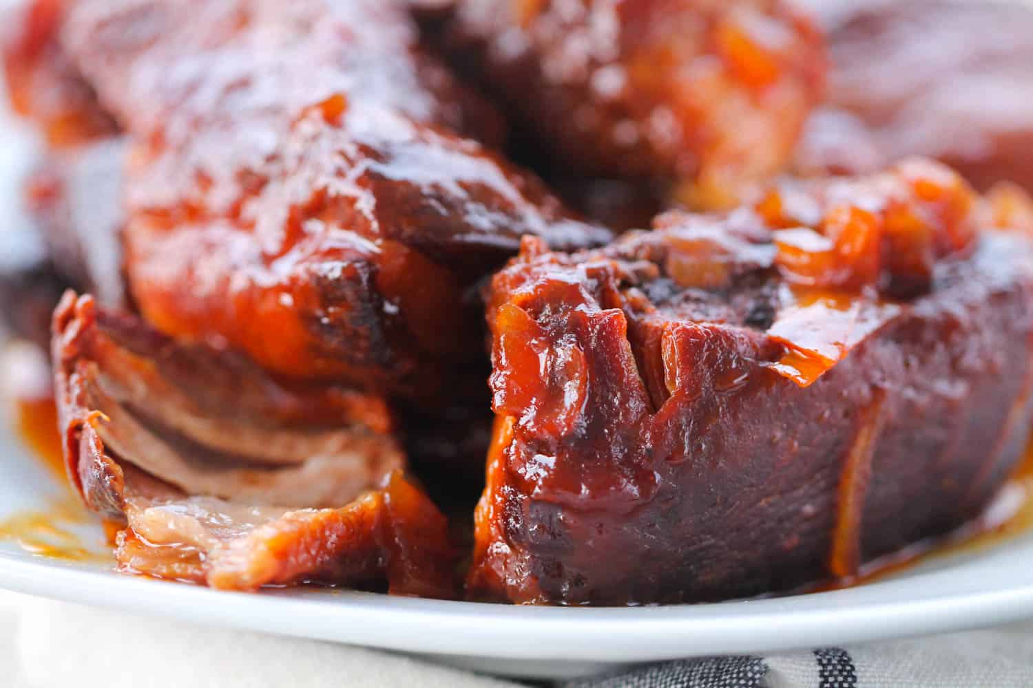 Slow Cooker BBQ Country Style Ribs on a white plate
