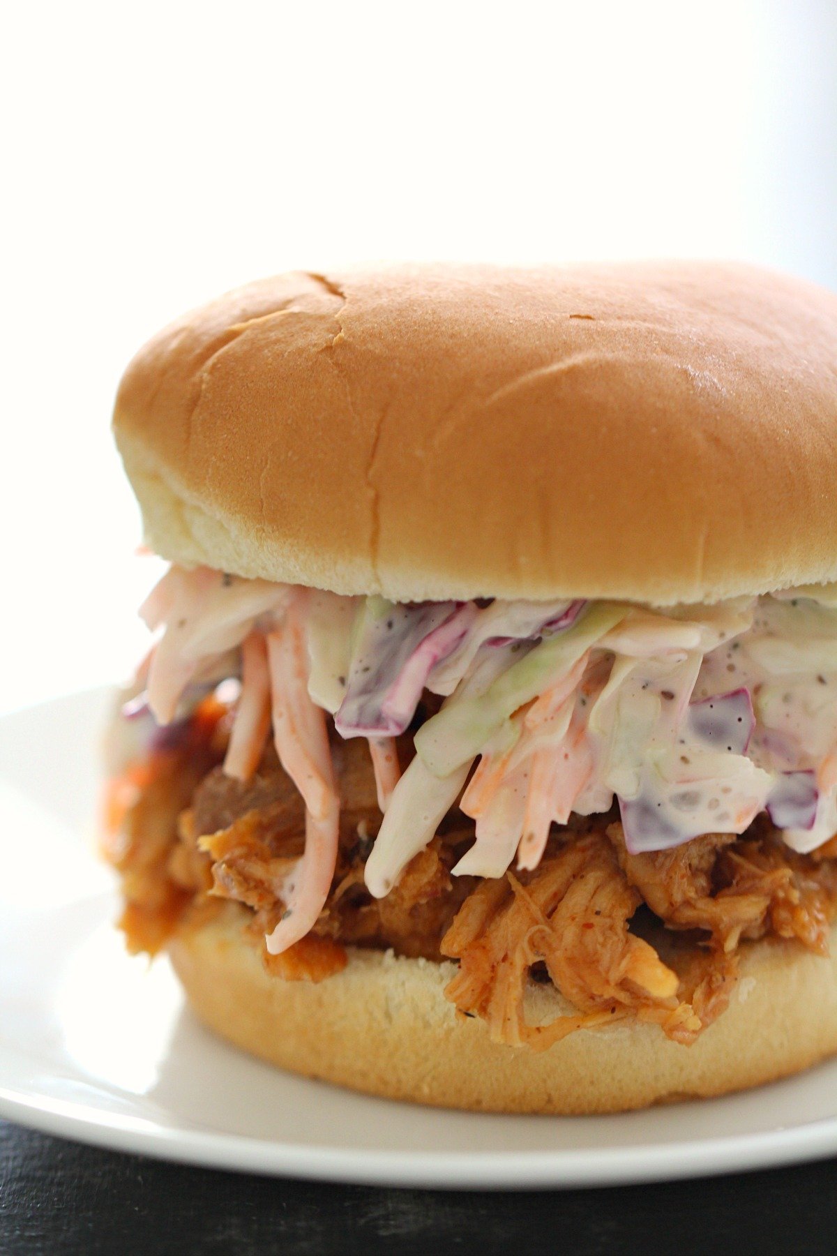 The BEST Slow Cooker BBQ Pulled Pork and Coleslaw Sandwiches Recipe