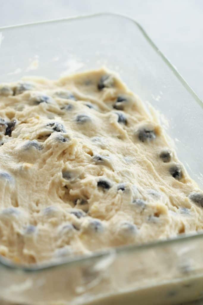 Lemon Blueberry Breakfast Cake batter in a baking dish.