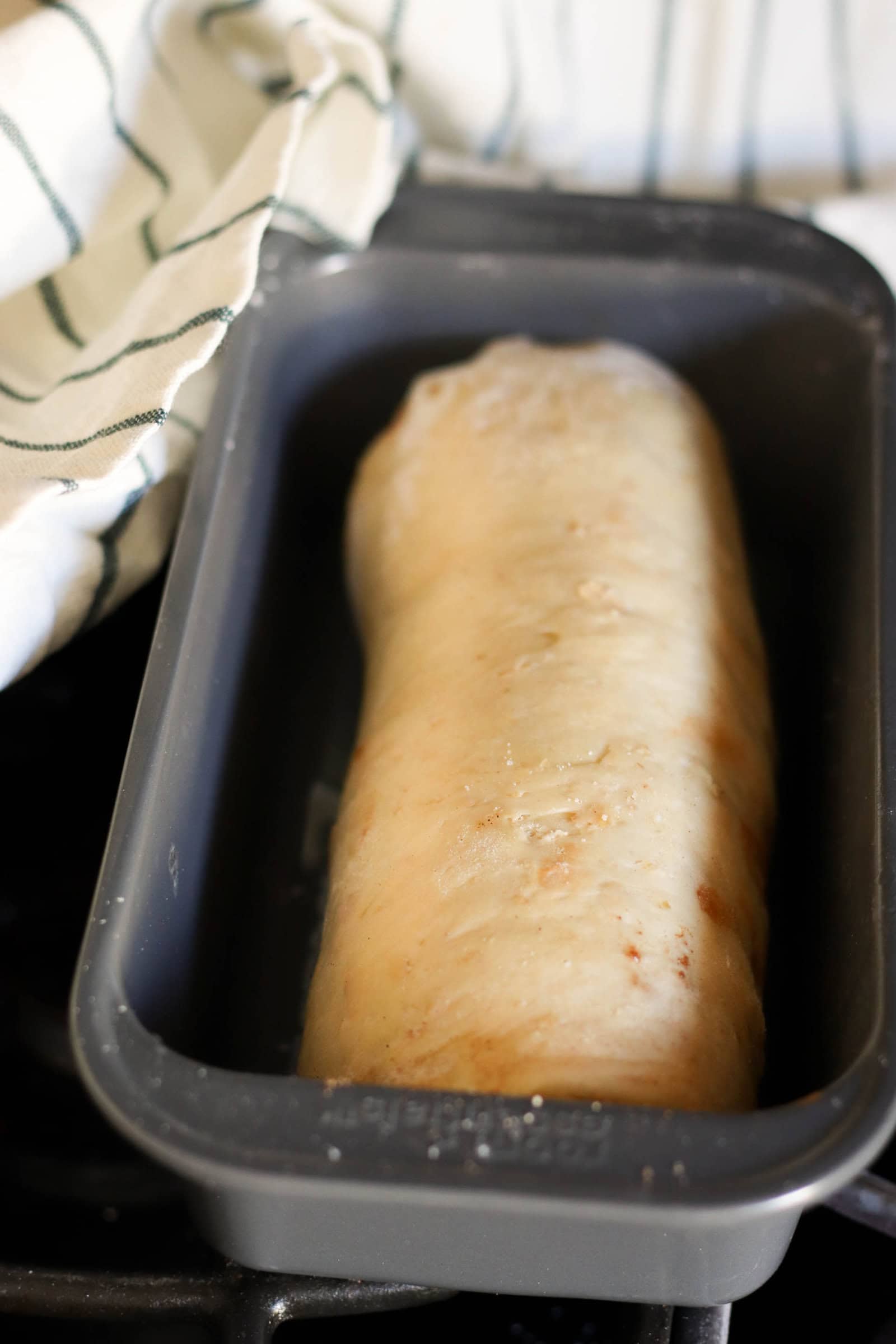 Unbaked Cinnamon Swirl Bread dough in bread pan