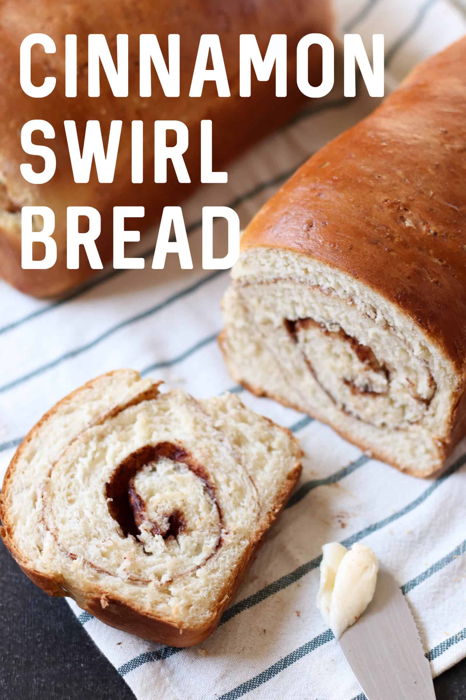 Cinnamon Swirl Bread slice with a pat of butter on a knife