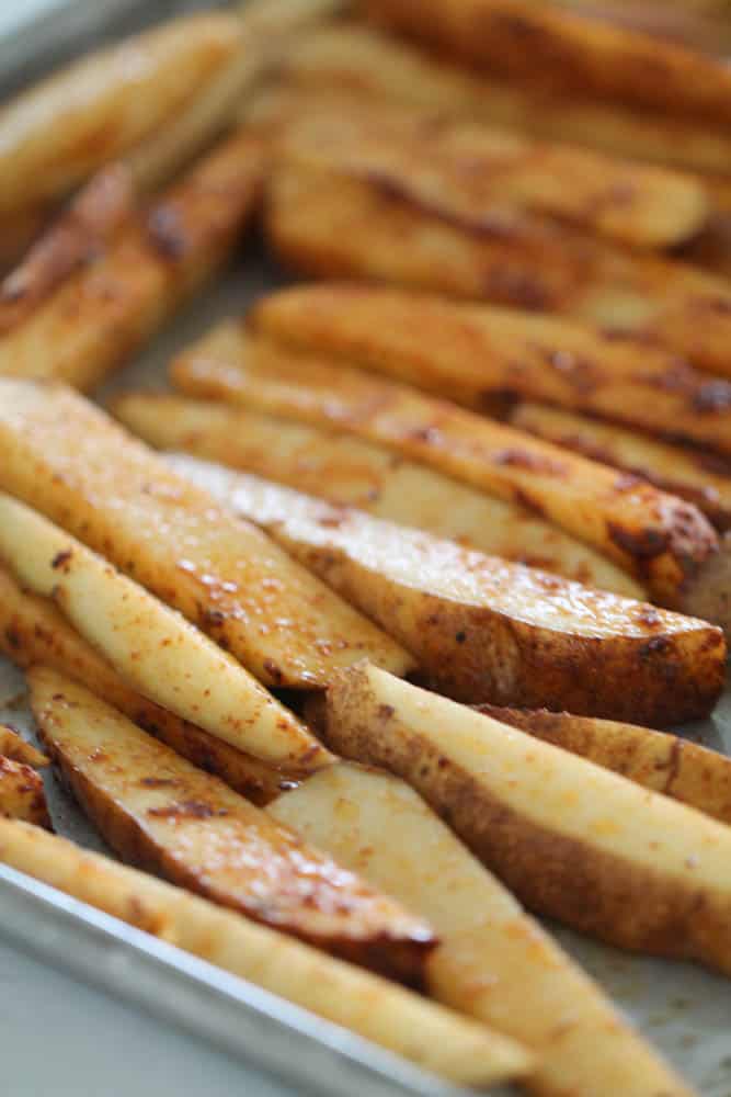 Unbaked Easy Baked Taco Fries on a baking sheet