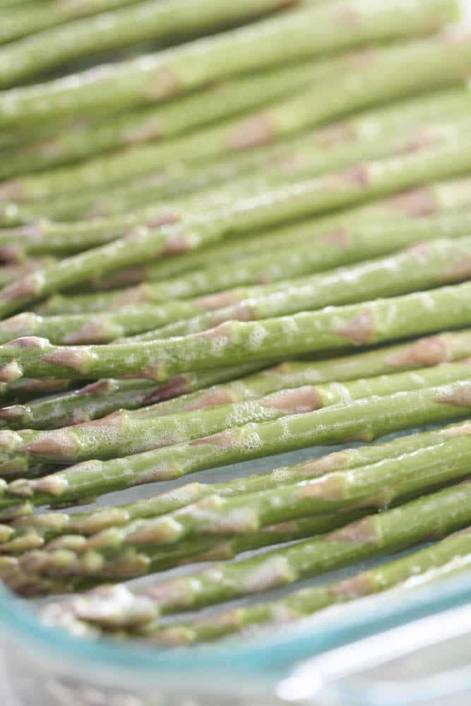 Washed asparagus in a pan