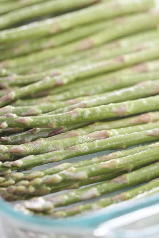 Washed asparagus in a pan