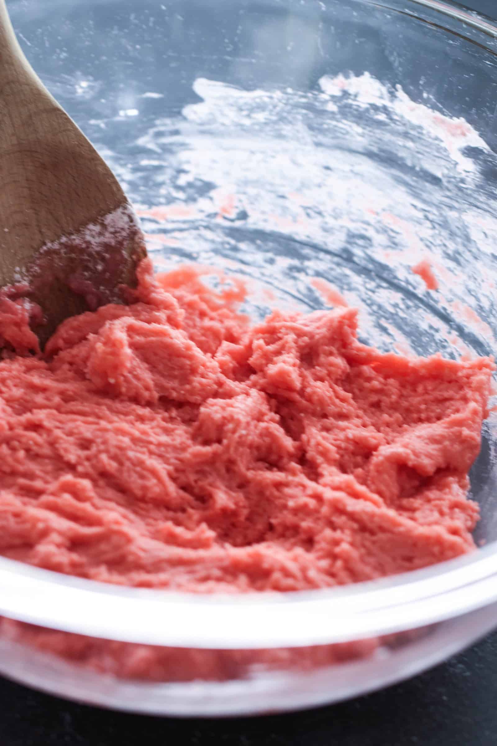 Strawberry Crinkle Cookie dough in a glass bowl