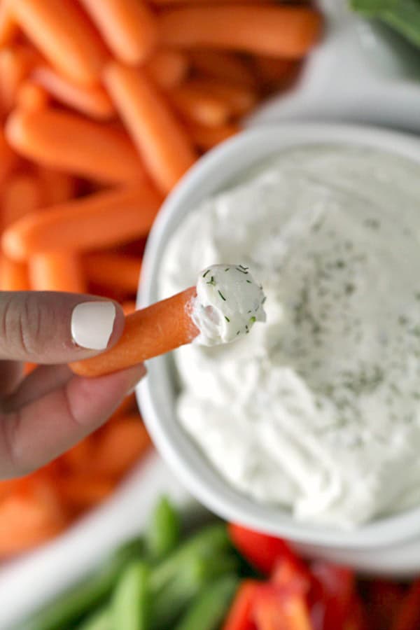 Carrot dipped in cottage cheese ranch dip