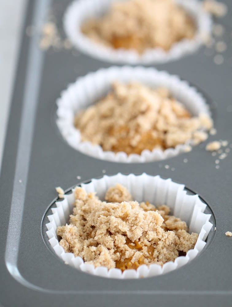 Pumpkin Spice Muffins in pan uncooked with streusel topping