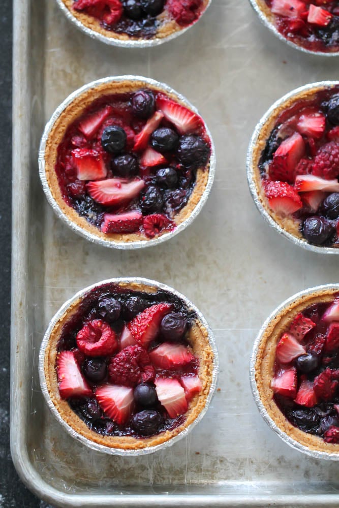 Mini Berry Pies on baking sheet