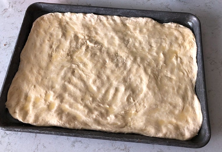 Sheet Pan Garlic Breadsticks dough in sheet pan