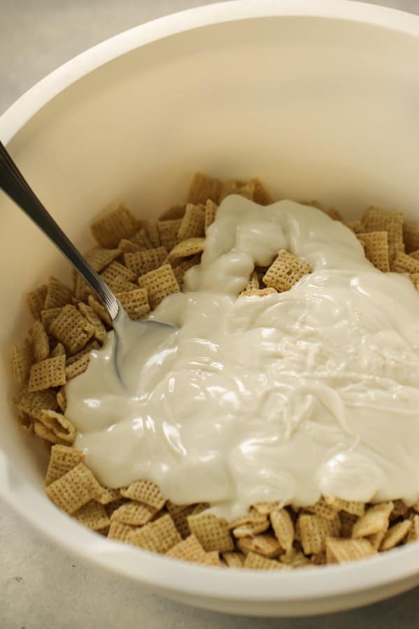 Cereal mixed with Muddy Buddies ingredients