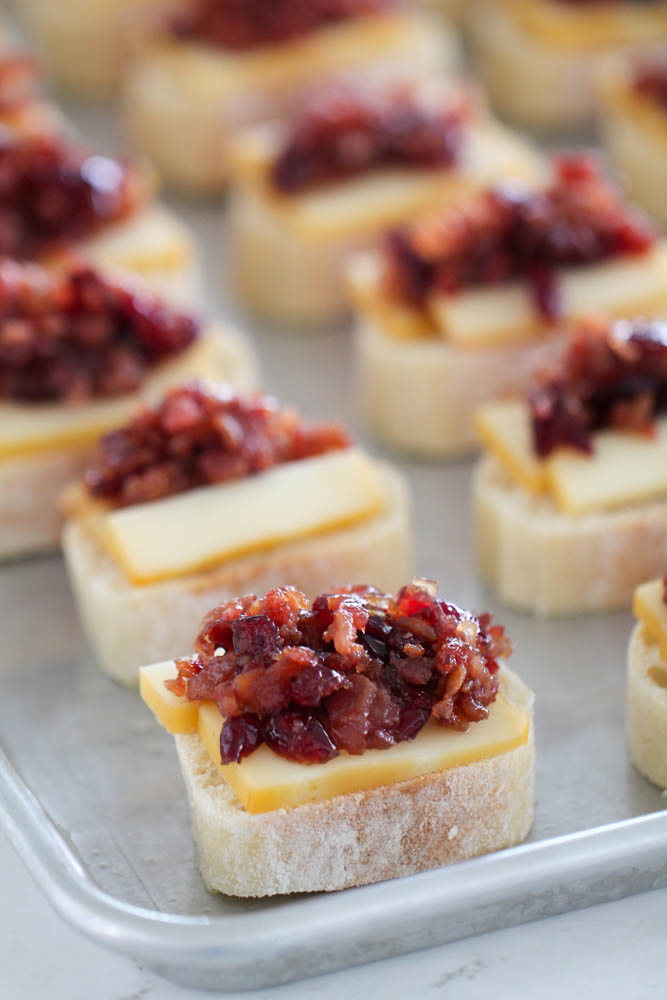 Bacon Cranberry Jam on top of the cheese and baguettes