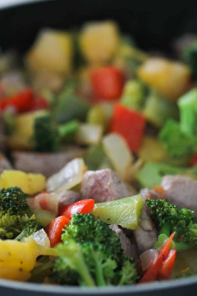 Pork and veggies in large pan