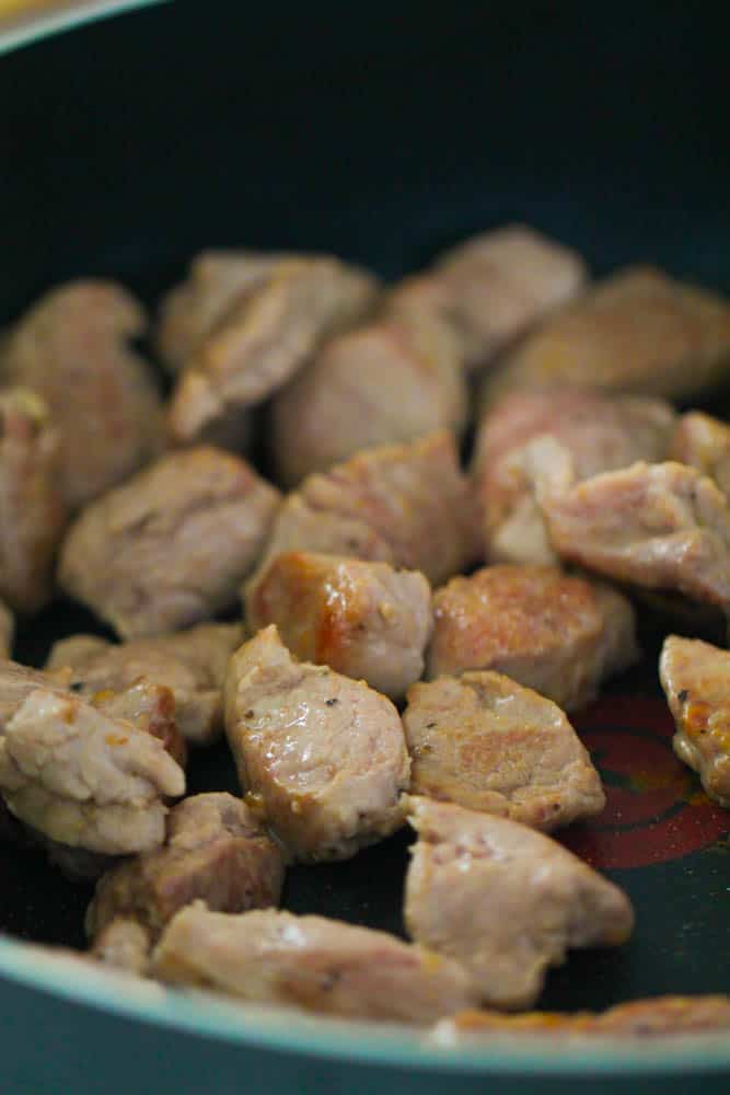 Pork cubed in large pan