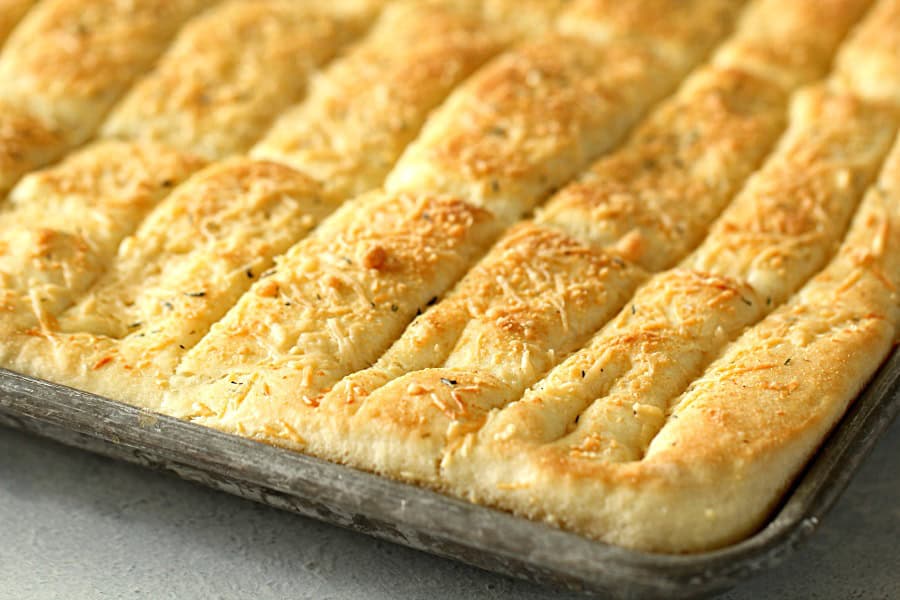 Baked Sheet Pan Garlic Breadsticks in pan