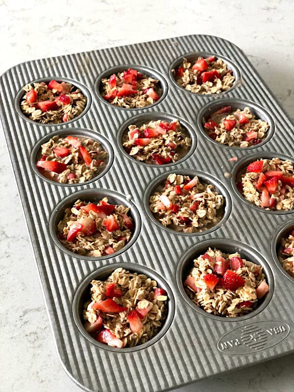 baked oatmeal in muffin pan ready to cook